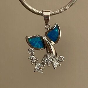 rhodium sterling silver whale tail bubble pendant diamond simulant and blue opal
